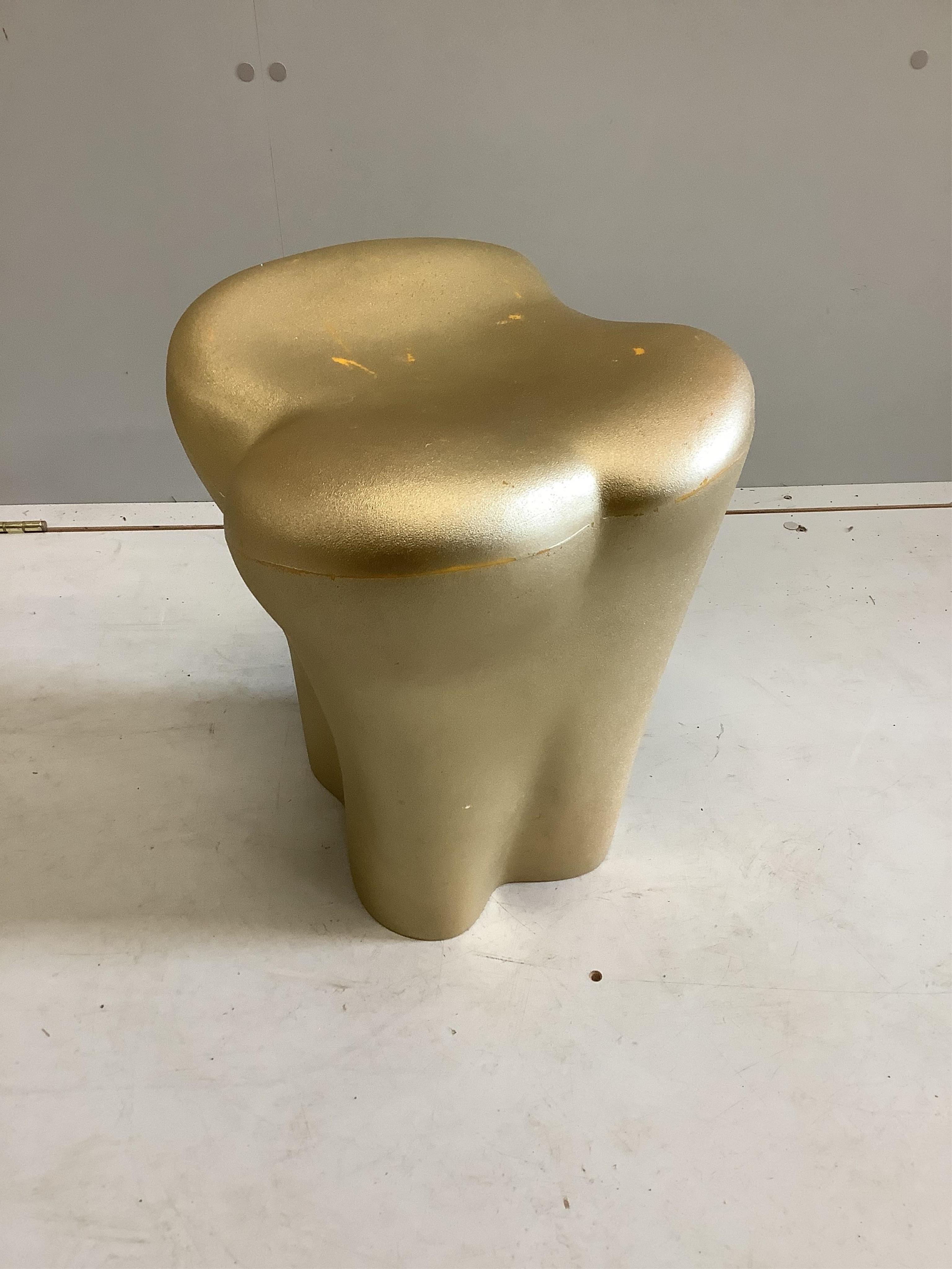 A Philippe Starck 'The Tooth' stool, width 36cm, depth 32cm, height 41cm. Condition - fair